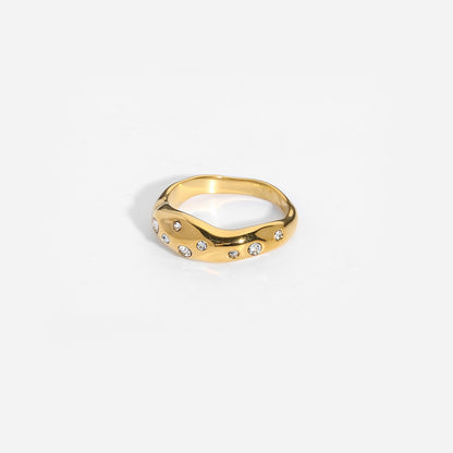 Gold snake-shape ring with small clear stones, wide band, front view