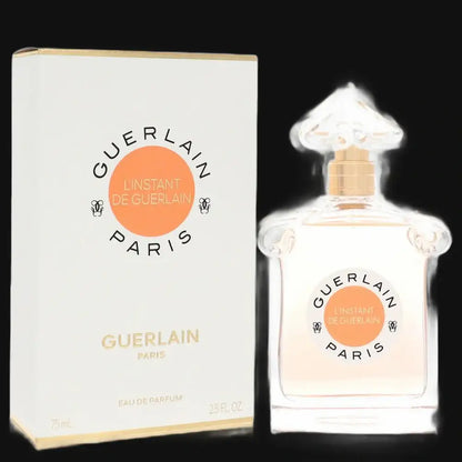 Guerlain L’Instant perfume for women: white bottle with gold cap, plus box