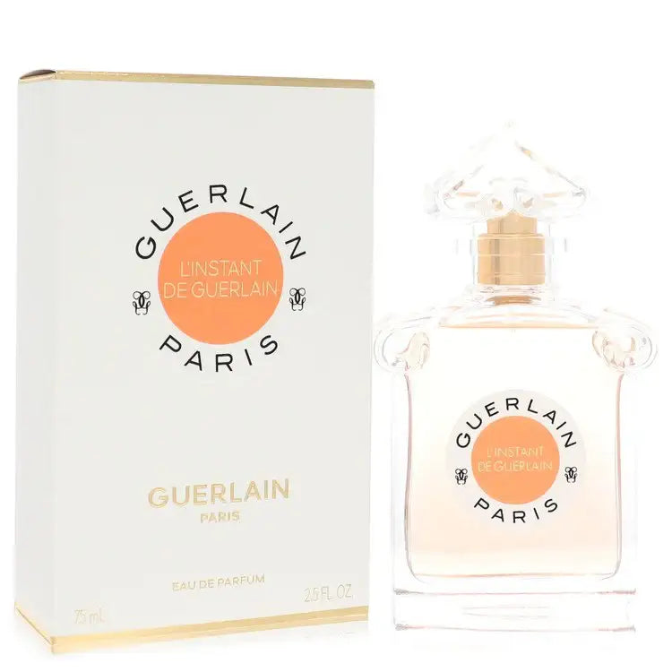 Guerlain L’Instant perfume for women: front view white bottle with gold cap and box