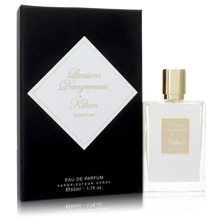 Perfume spray bottle with gold cap beside black Eau de Parfum box