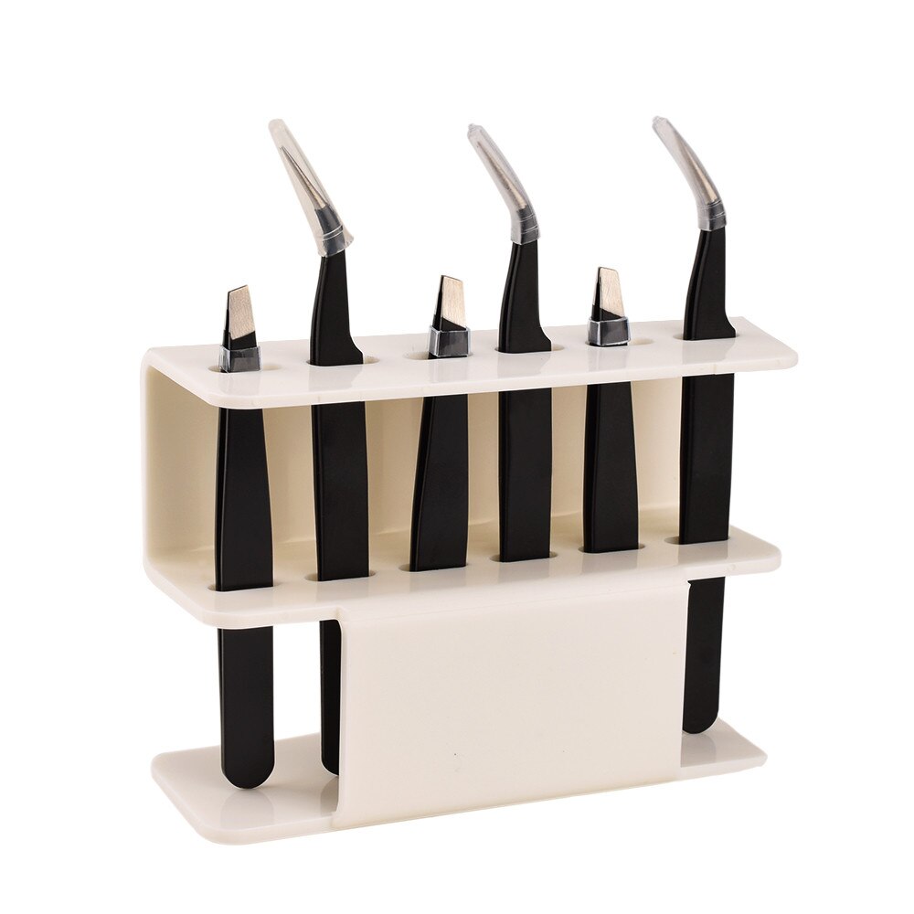 White acrylic eyelash tweezer holder with two shelves and upright insert slots