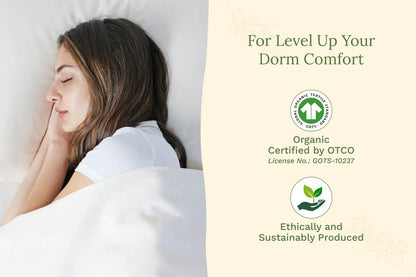 Light cream bedsheet set on a sleeping person with pillow and fitted sheet