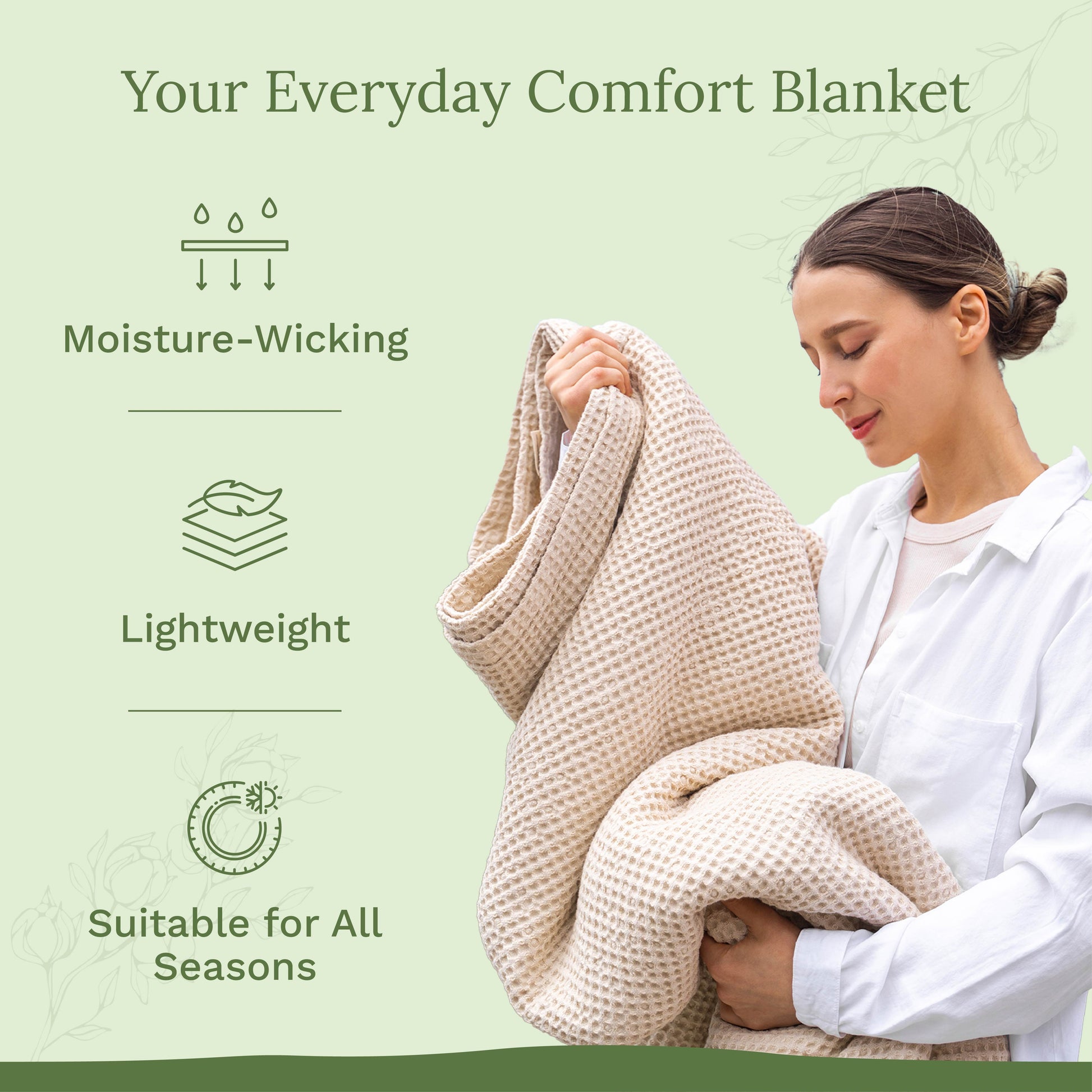 Waffle-weave blanket, light beige, folded and held close by a person.