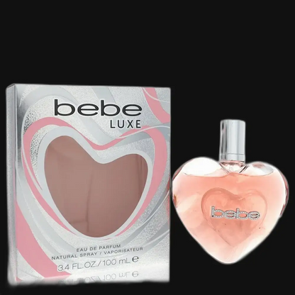 Women's eau de parfum bottle and box, bebe Luxe heart-shaped glass with spray cap