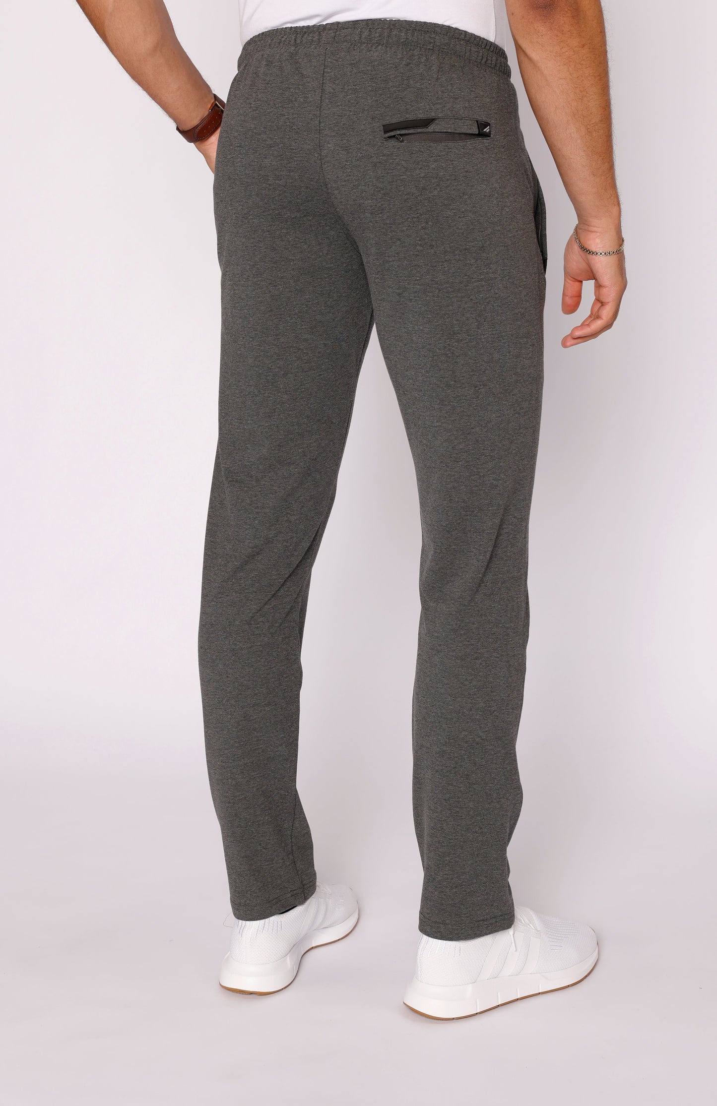 Dark heather grey athletic sweatpants with elastic waistband and tapered ankle hem