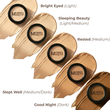 Assorted concealer compacts with light to dark beige shades in black cases