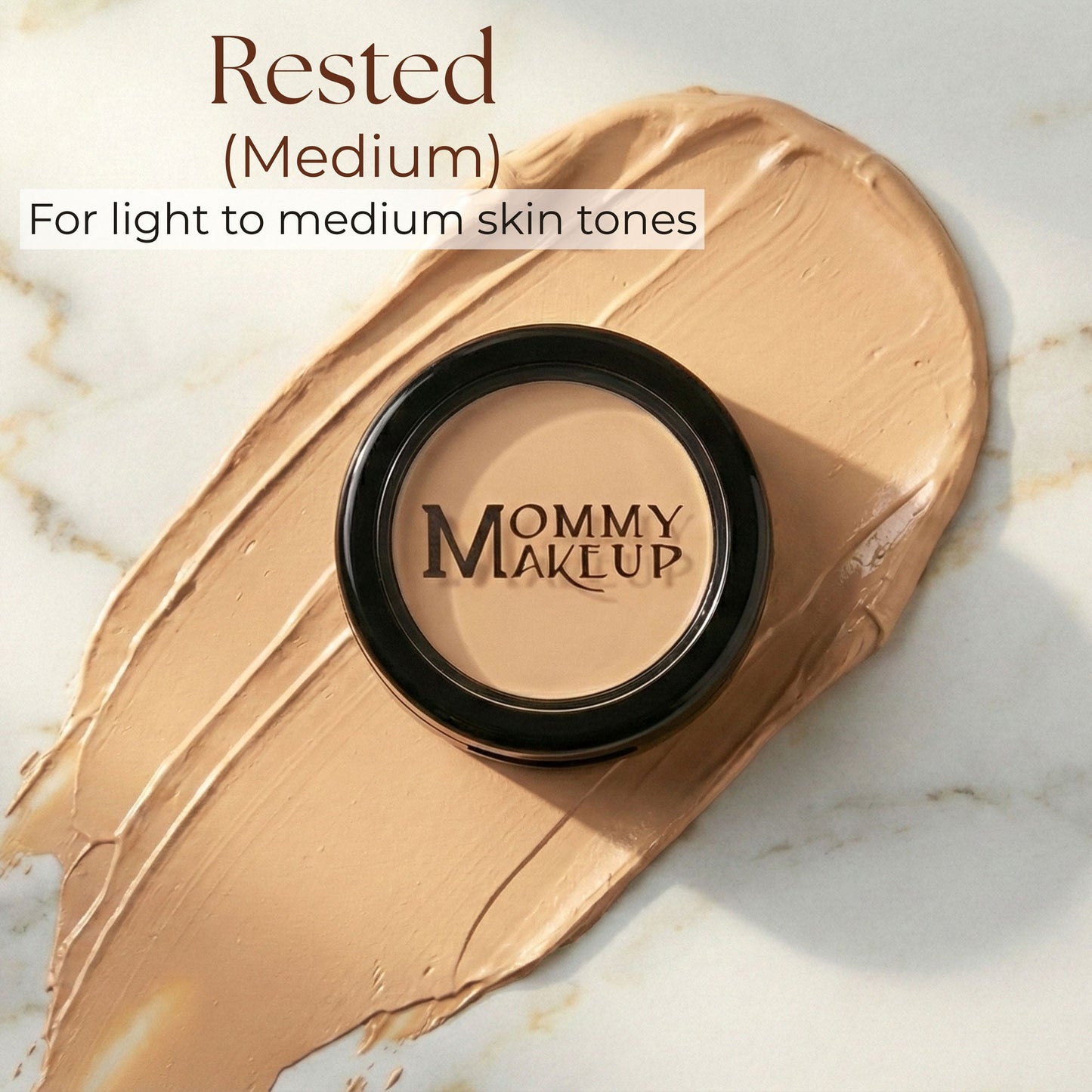 Makeup concealer pan in medium Rested beige shade with cream swatch.