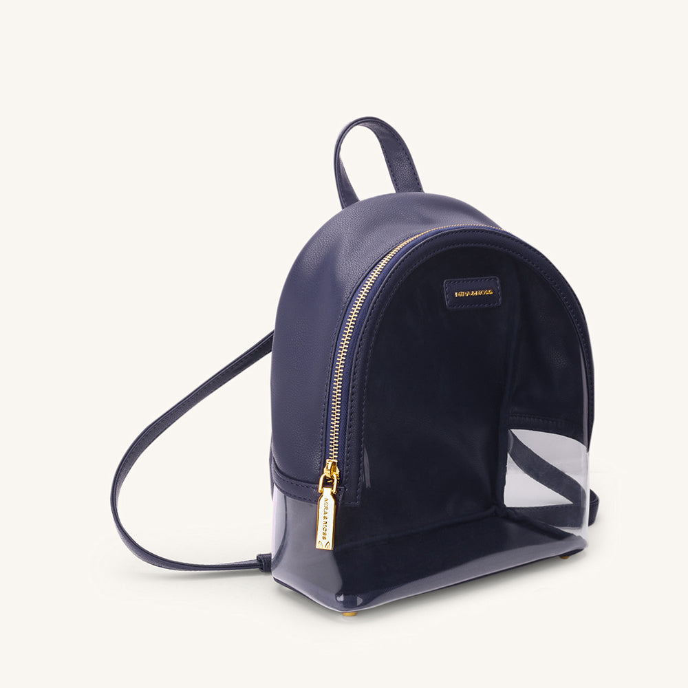 Navy clear-front mini backpack with gold zipper and shoulder strap