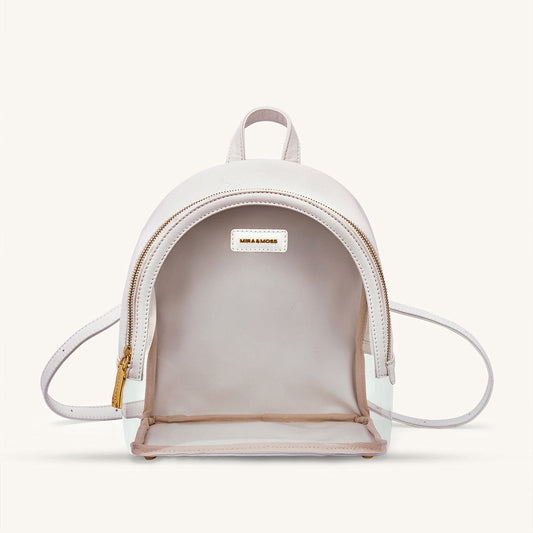 Ivory clear-front mini backpack with top handle and adjustable crossbody strap