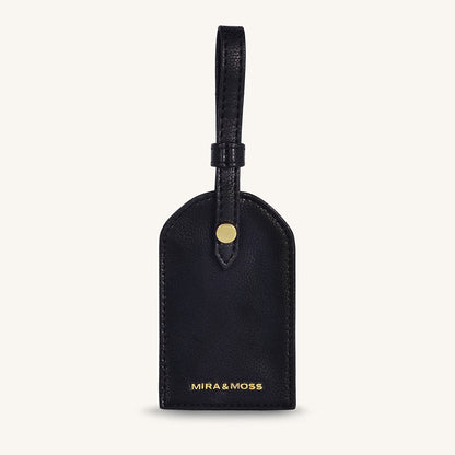 Black leather travel tag with top loop and gold MIRA&MOSS logo