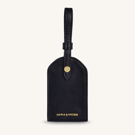 Black leather travel tag with top loop and gold MIRA&MOSS logo