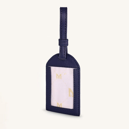Alexis travel tag with clear ID window and dark blue leather, hanging loop