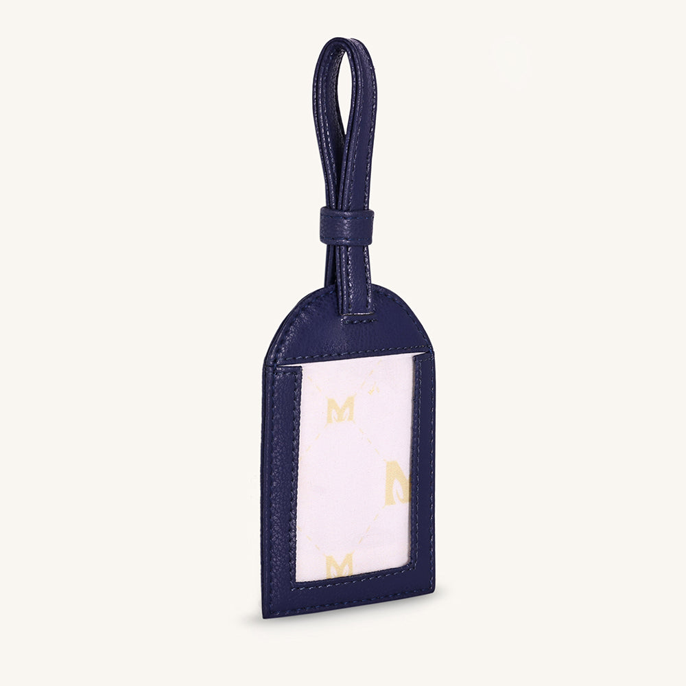 Alexis travel tag with clear ID window and dark blue leather, top loop