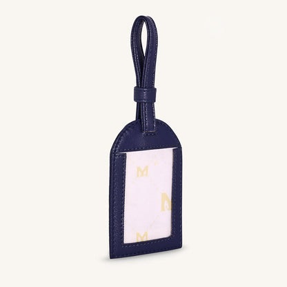 Alexis travel tag with clear ID window and dark blue leather, top loop