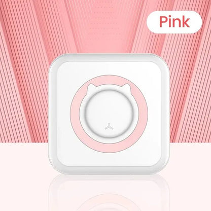 Pink portable thermal sticker mini printer, front view with round button