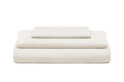 Natural cotton sateen bed sheet set, neatly folded sheets