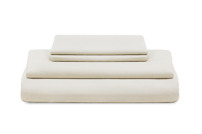 Pure white sateen bed sheet set, neatly folded sheets