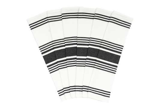 Set of kitchen towels with black-and-white horizontal stripes, folded.