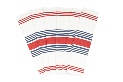 Set of kitchen towels folded, white with red, navy, and blue stripe bands