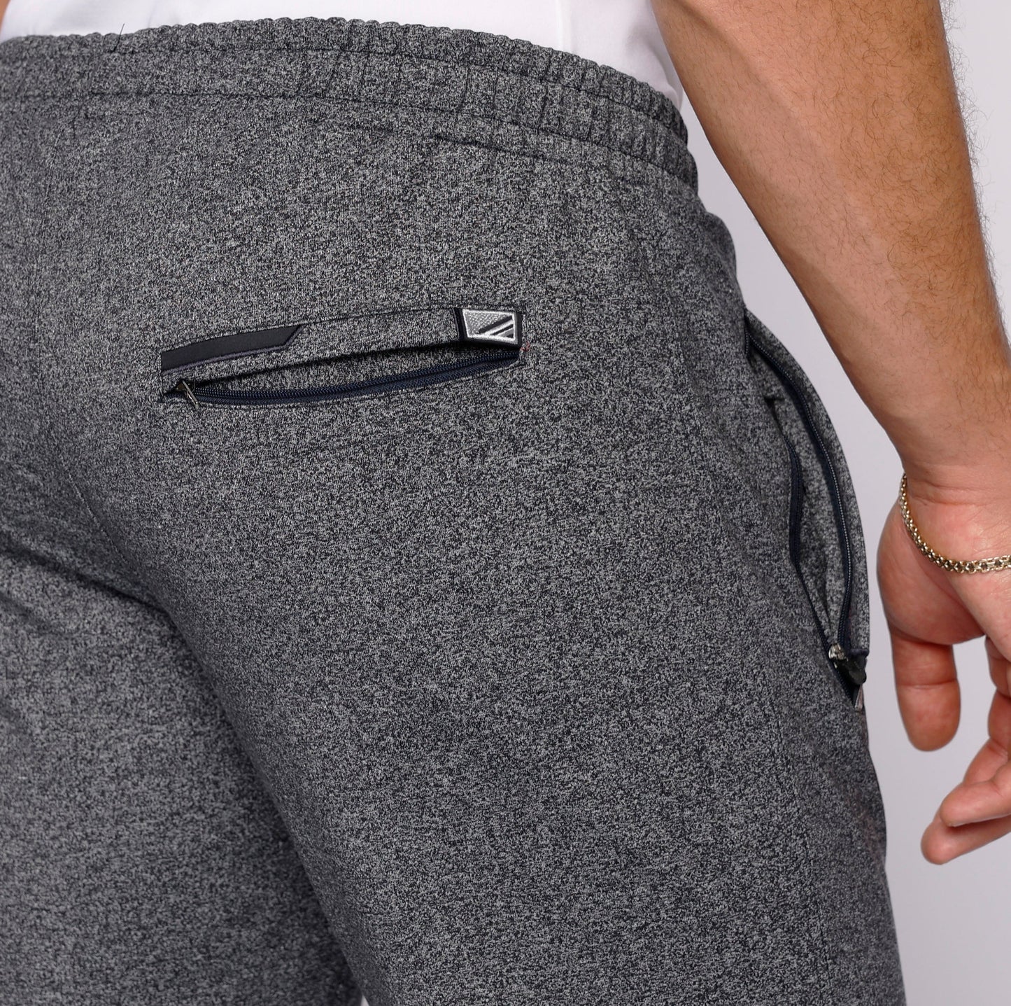 Men's athletic sweatpants, dark heather grey, zip pocket detail on the back hip