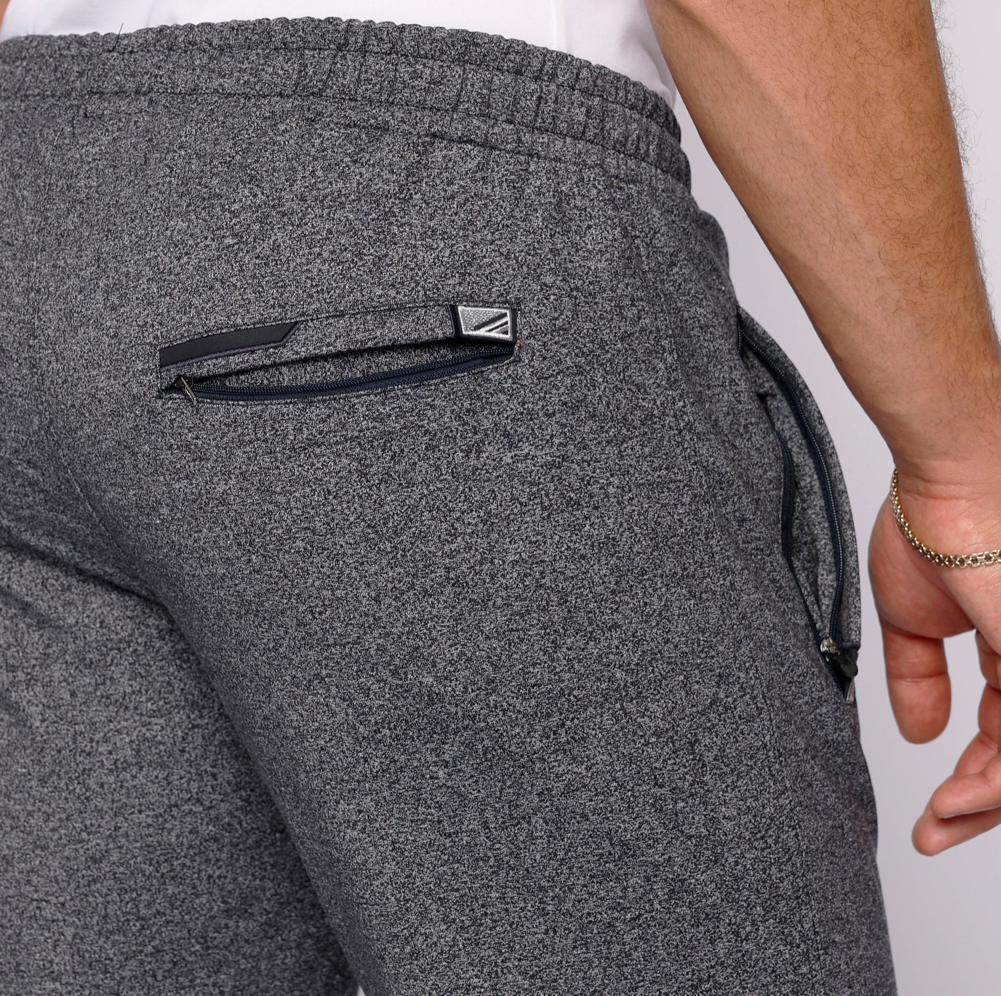 Men's athletic sweatpants, dark heather grey, zip pocket detail on the back hip