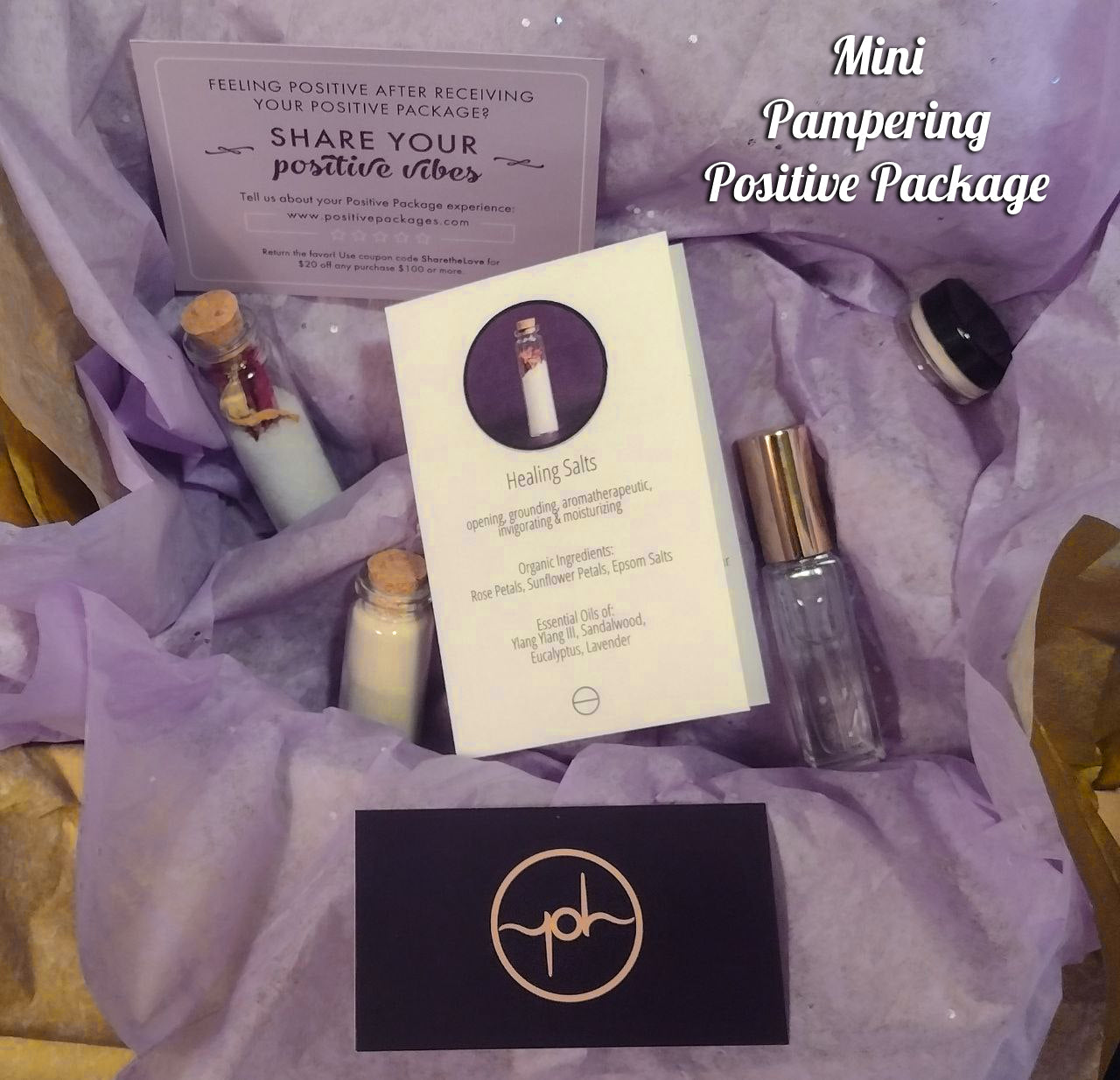 Pampering Positive Package gift set with purple filler, cards, and small bottles