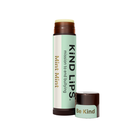 Mint Mint lip balm stick with brown cap and small Be Kind container