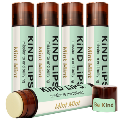Mint Mint lip balm pack with four sticks, one open, plus a Be Kind mini
