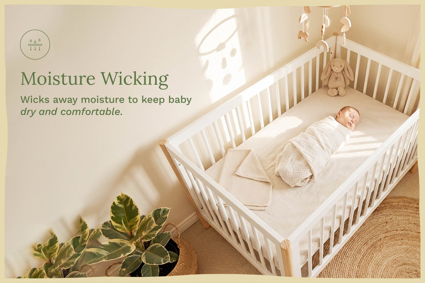 Natural cotton baby crib fitted sheet on a crib mattress, side and top view