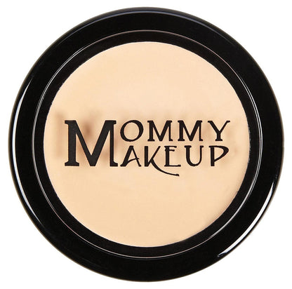 Concealer compact with light beige cream in a round black case