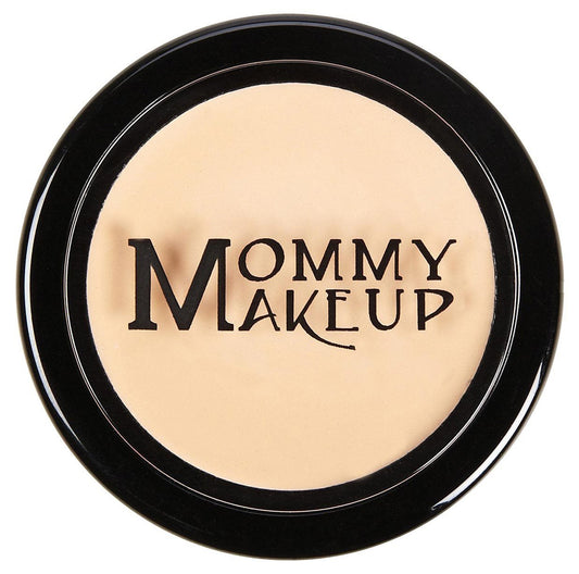 Concealer compact with light beige cream in a round black case