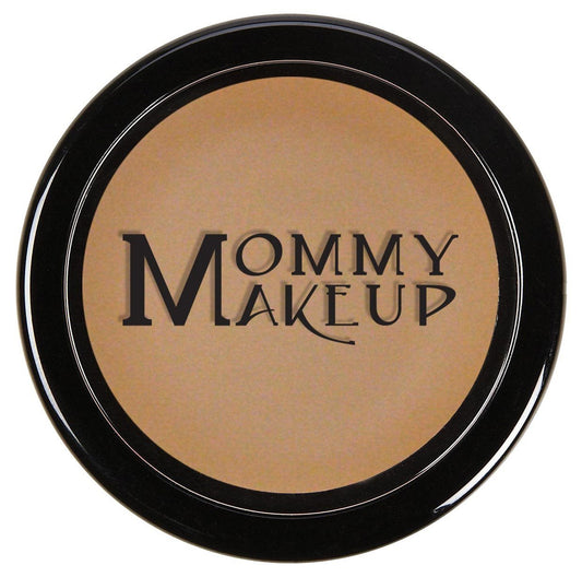 Concealer compact, round black lid with tan medium-dark cream center