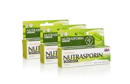 Nutrasporin ointment multipack with stacked boxes and tubes on reflective surface