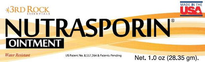 Nutrasporin ointment label front text, orange stripe and leaf icon