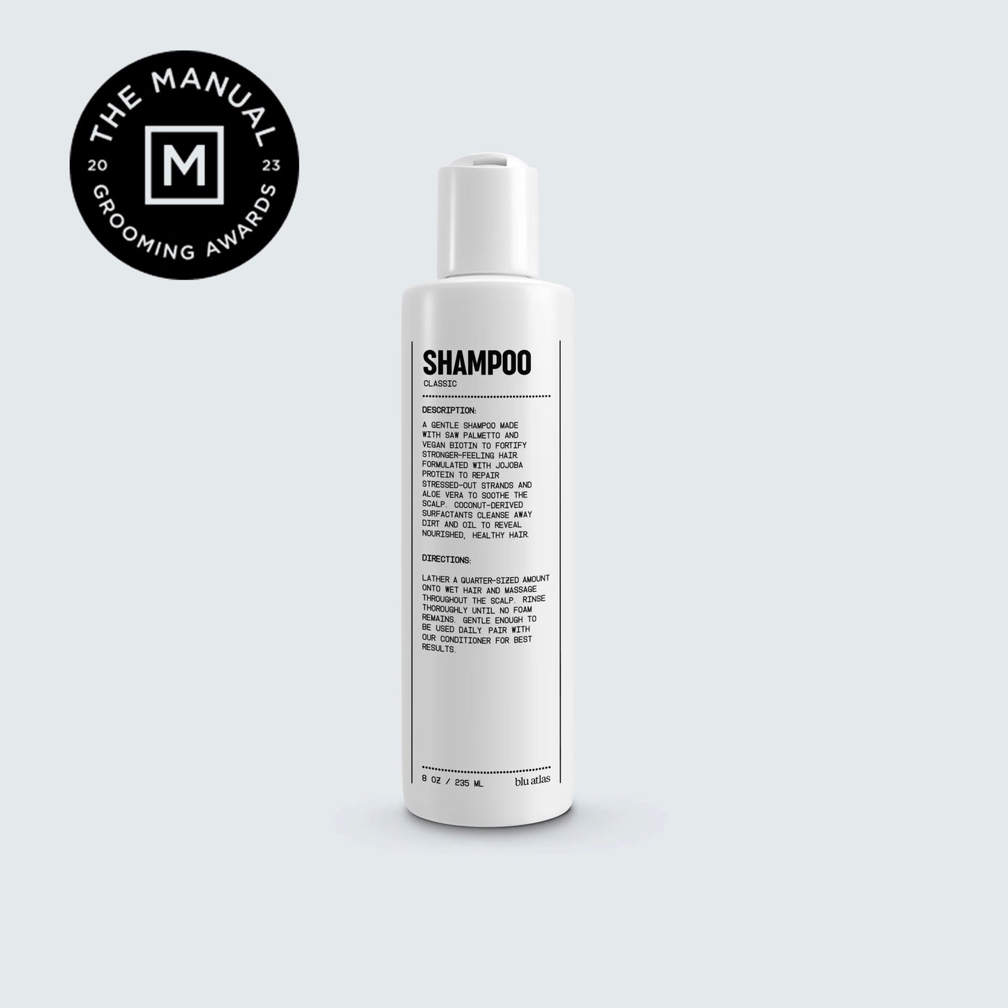 Natural shampoo bottle with white pump top and SHAMPOO front label