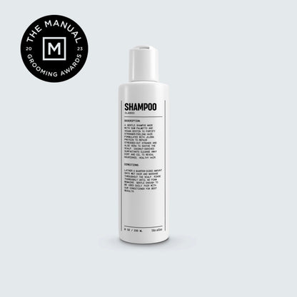 Natural shampoo bottle with white pump top and SHAMPOO front label