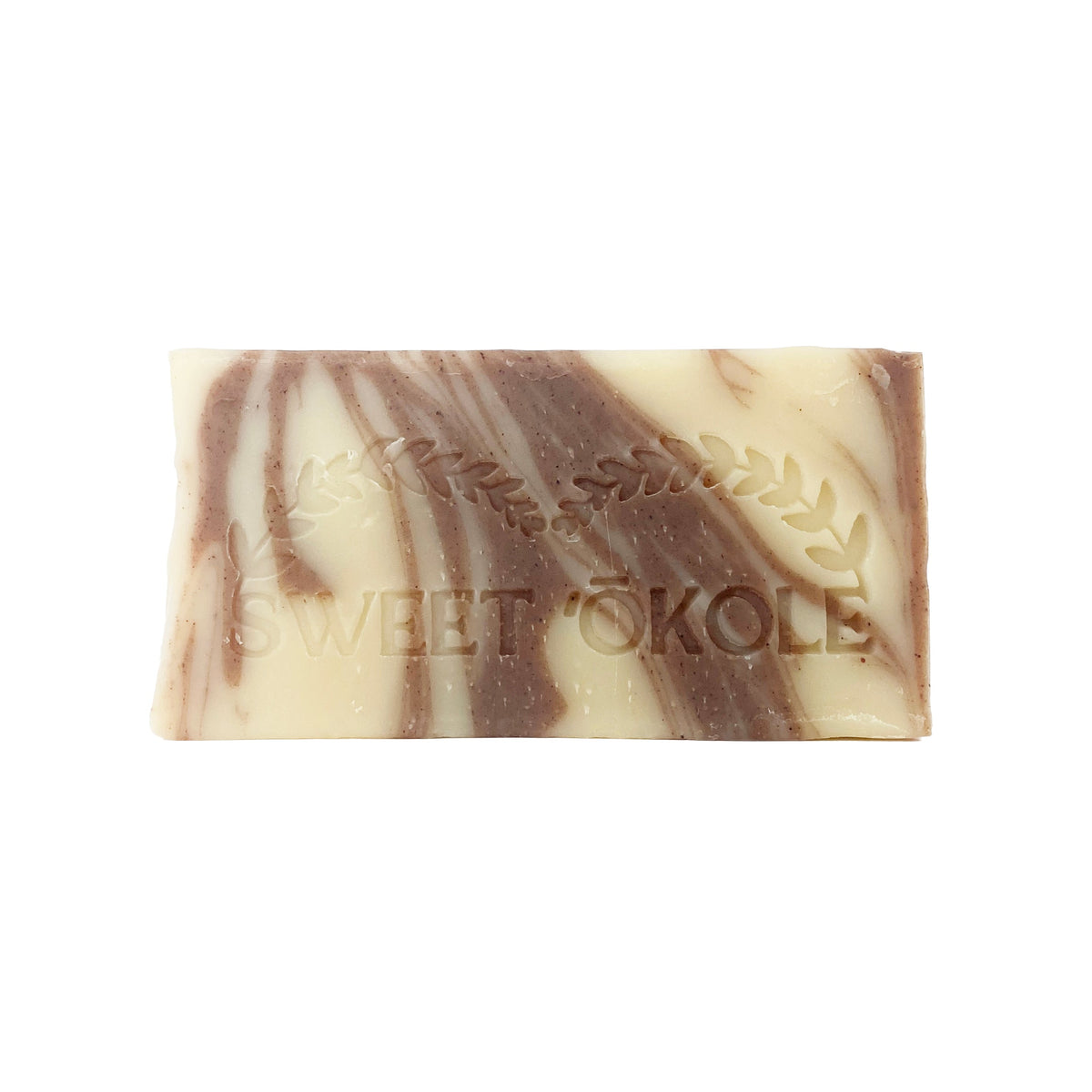 Neem Bark & Patchouli Soap bar close-up with creamy base and brown marbled lines