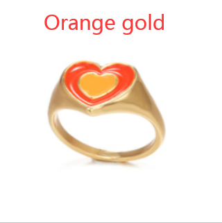 Heart ring with orange enamel heart on gold-tone band