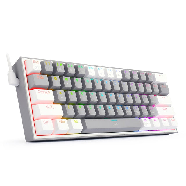 Mini mechanical wired gaming keyboard with dark case, mixed white keycaps, RGB glow