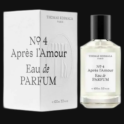 Unisex perfume elixir bottle with clear glass and black cap, paired with white box