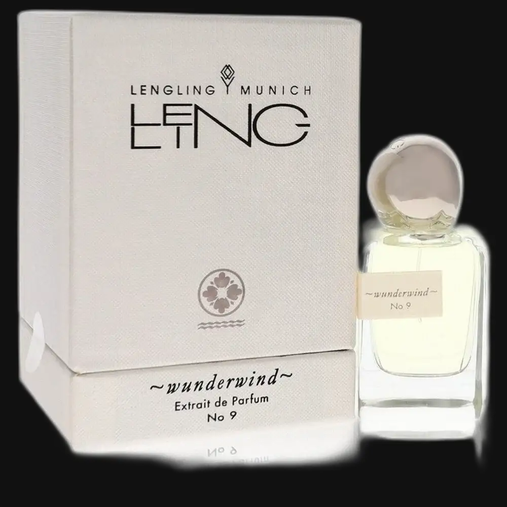 Unisex perfume gift set: off-white box and clear glass bottle with label