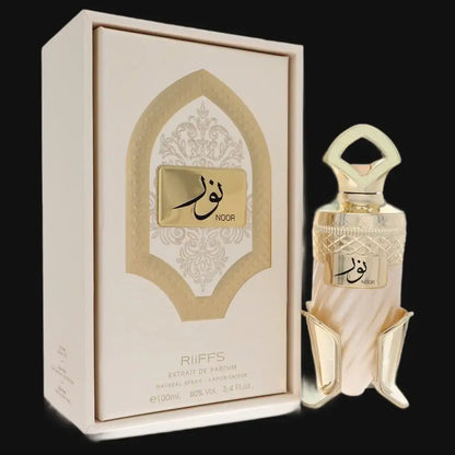 Unisex perfume set with boxed bottle; cream bottle, gold cap and label accents