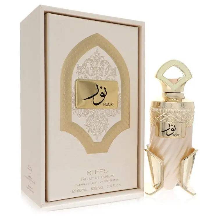 Unisex perfume bottle and gift box; cream glass with ornate gold trim and cap