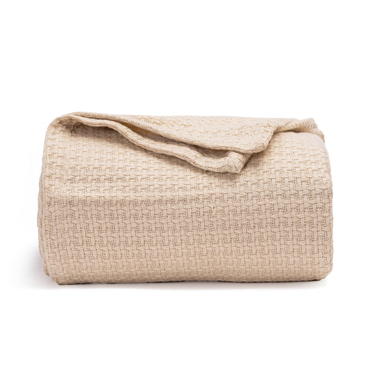 Beige basket-weave blanket with folded edge and draped loop detail