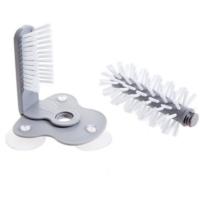 Gray kitchen bottle brush with white bristles, angled view with base stand