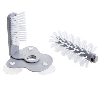 Gray kitchen bottle brush with white bristles, angled view with base stand