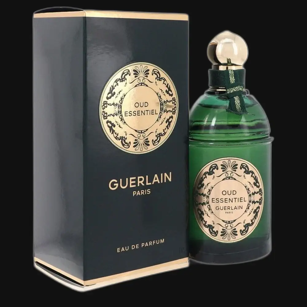 Green glass oud eau de parfum bottle with dark box and gold label, Guerlain Paris