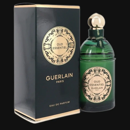 Green glass oud eau de parfum bottle with dark box and gold label, Guerlain Paris