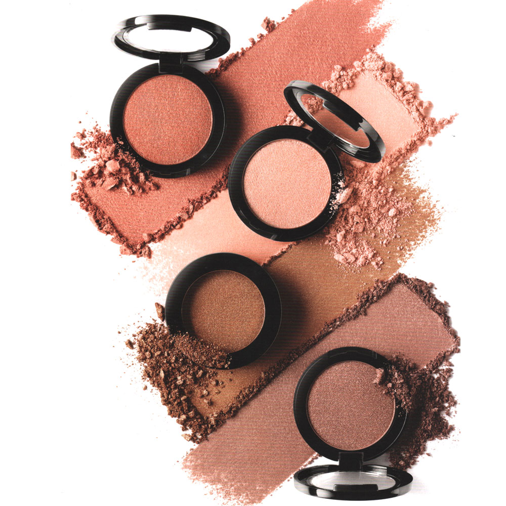Eye and cheek powder compacts with bronze shimmer and pressed powder swatches