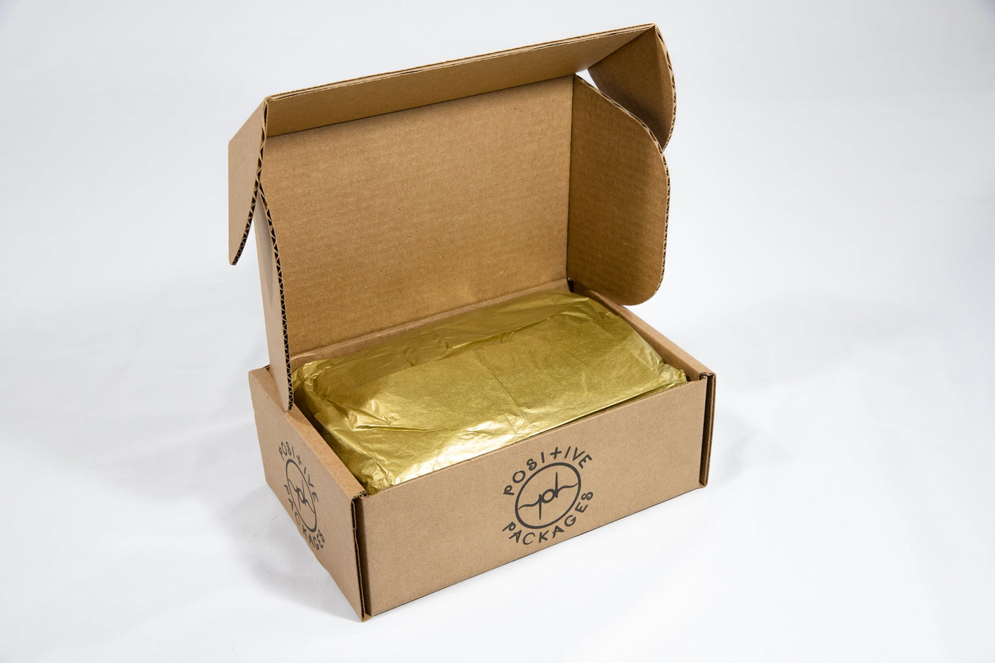 Mane Positive Package box with gold tissue filler, open